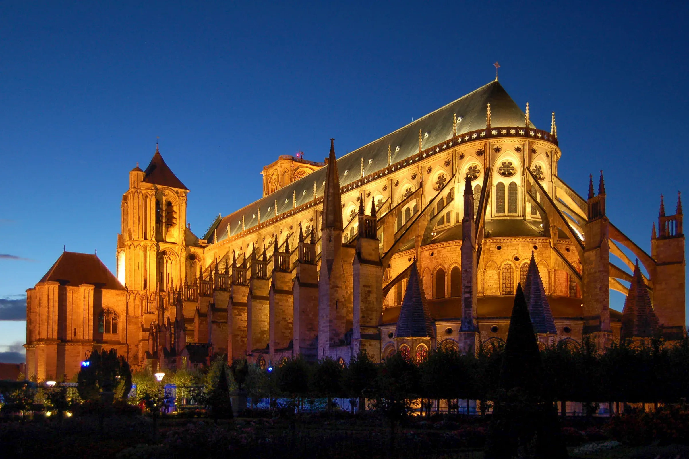 Saint-Étienne Cathedral in Bourges lit up at blue hour, chevet and flying buttresses