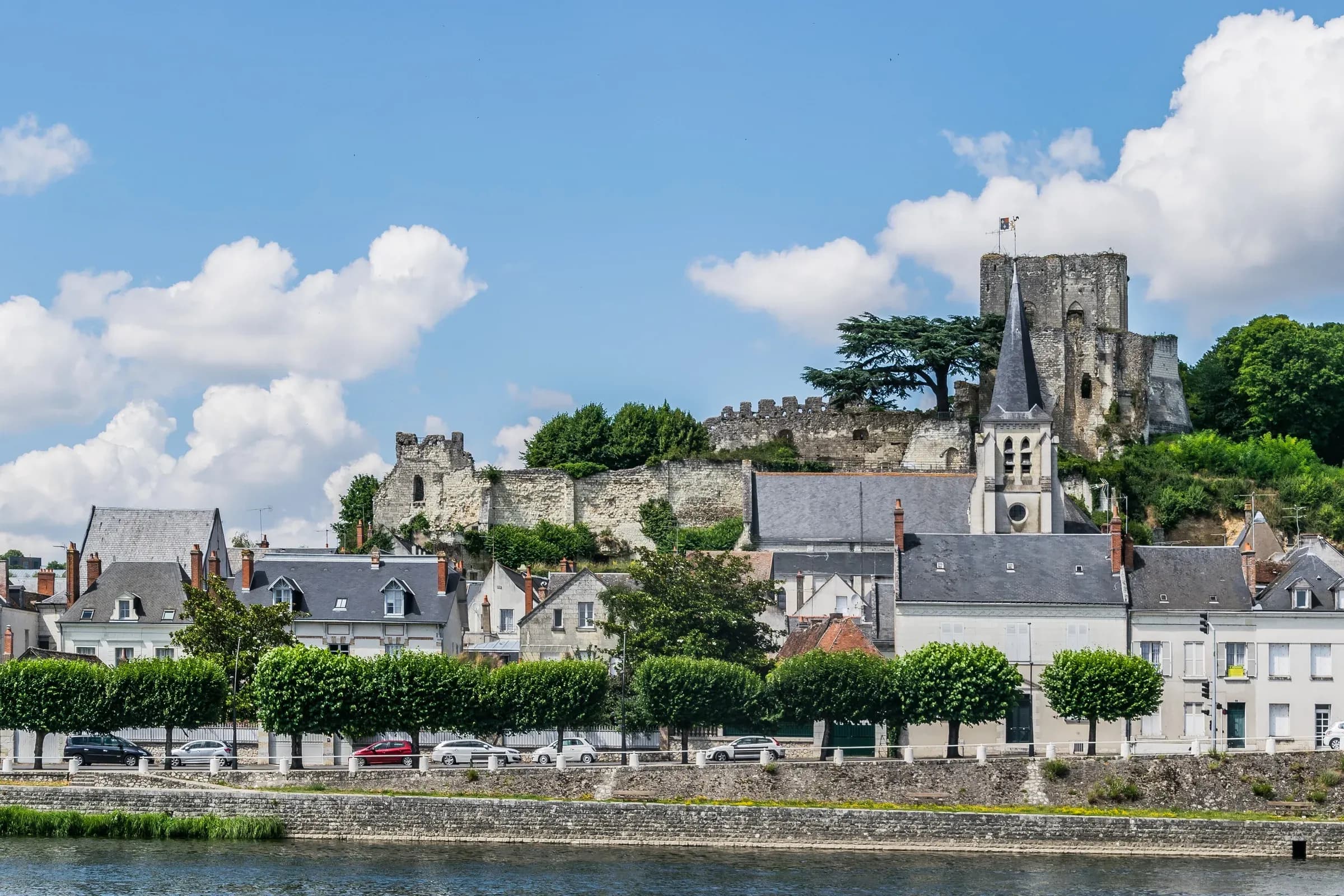 Montrichard seen from the Cher, the medieval keep and the church above the houses
