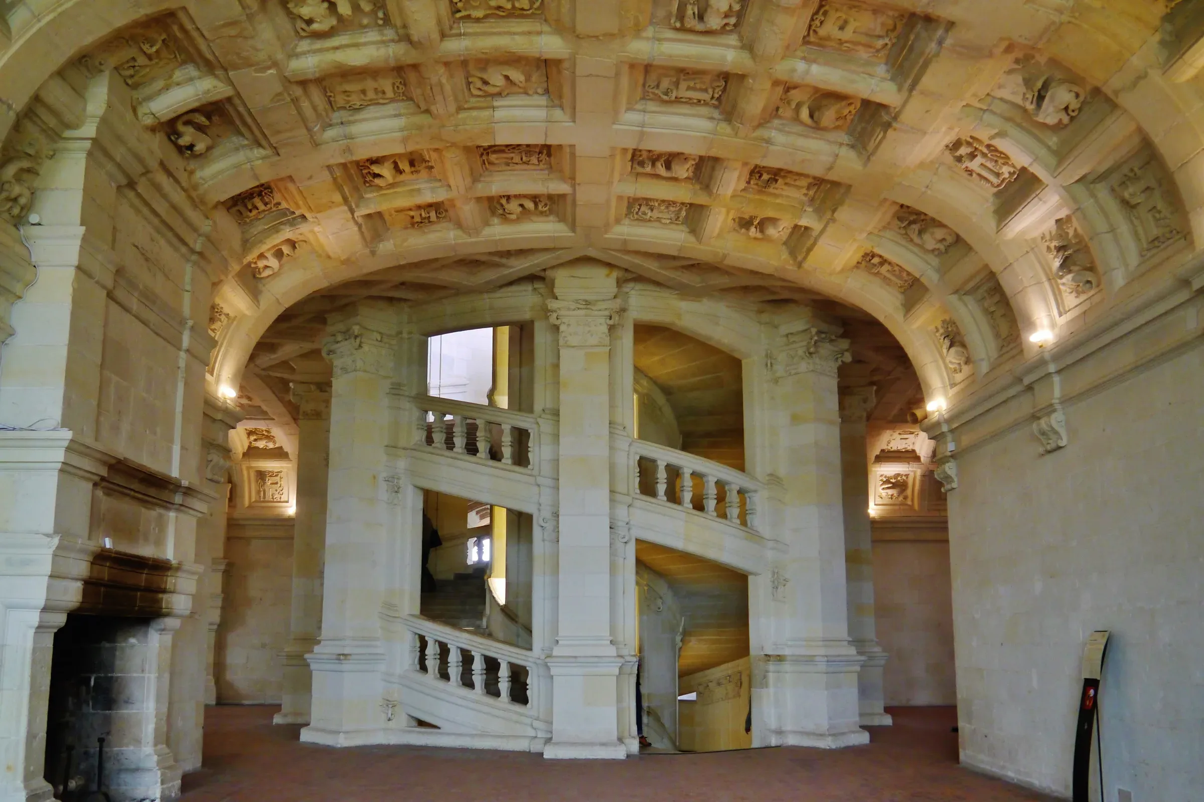Double-helix staircase of the Château de Chambord beneath its coffered vault