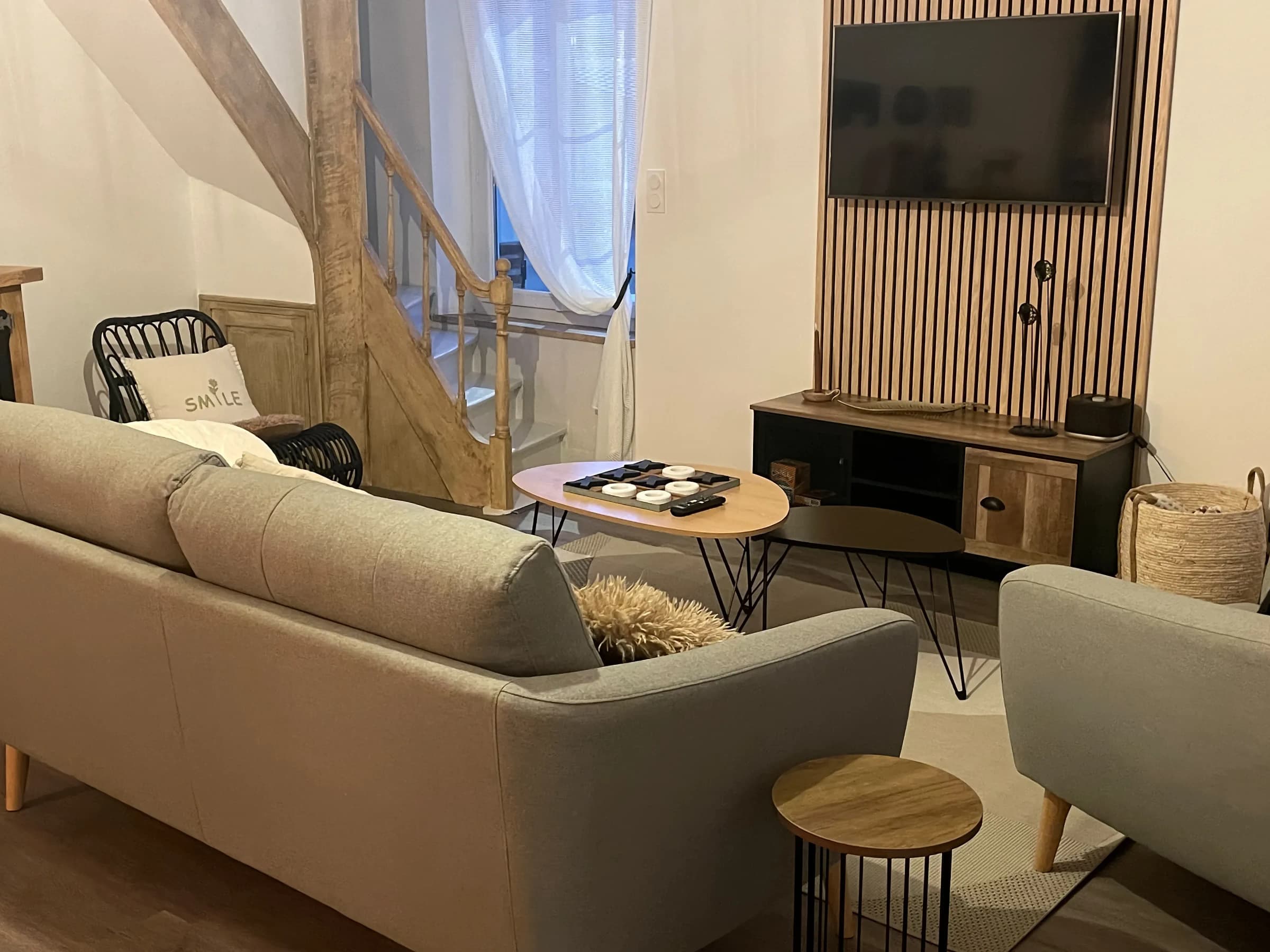 Living room, sofa, TV and staircase